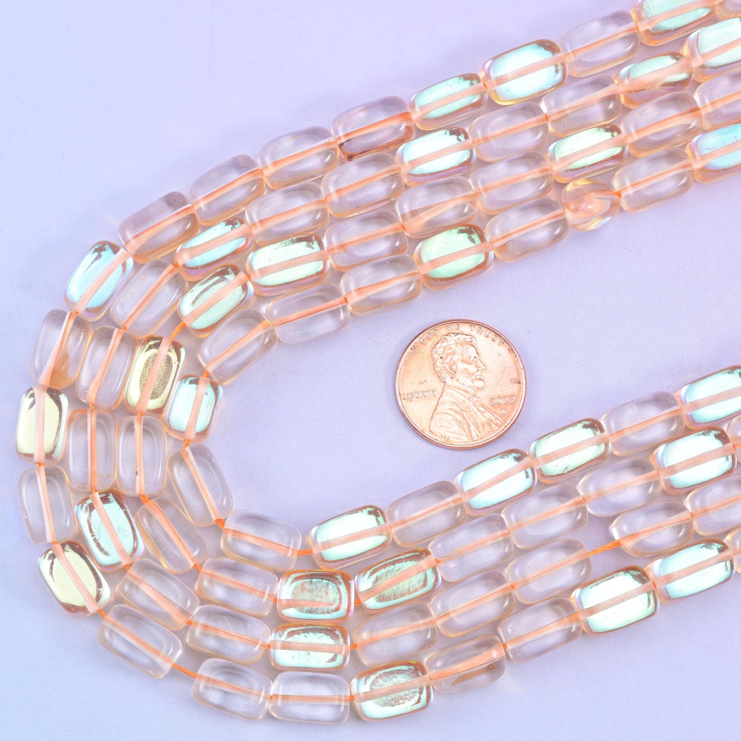 Orange Mystic Aura glass beads, 15 inch strand