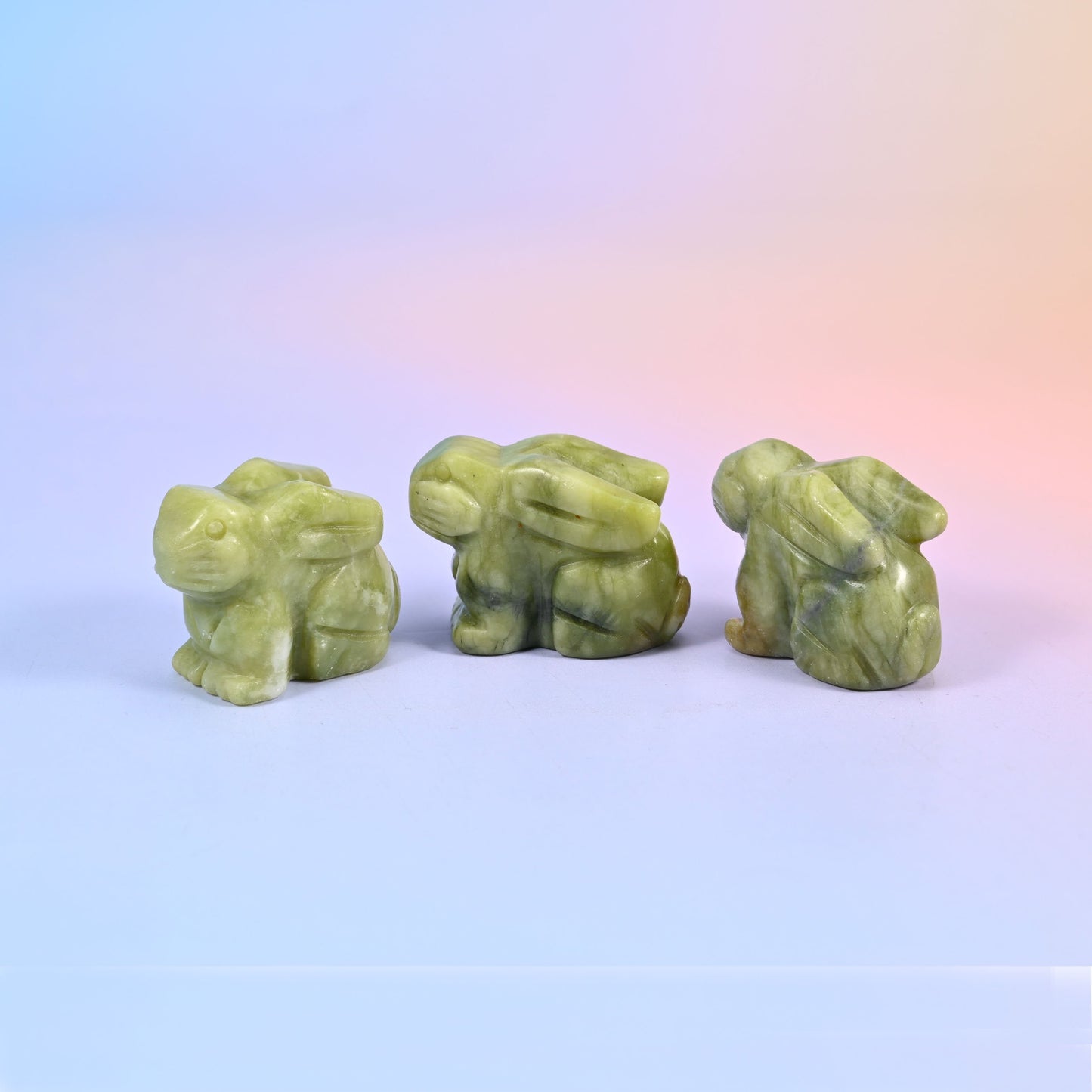 1.5 inch carved stone rabbit figurine, natural stone so veining and colour vary piece to piece