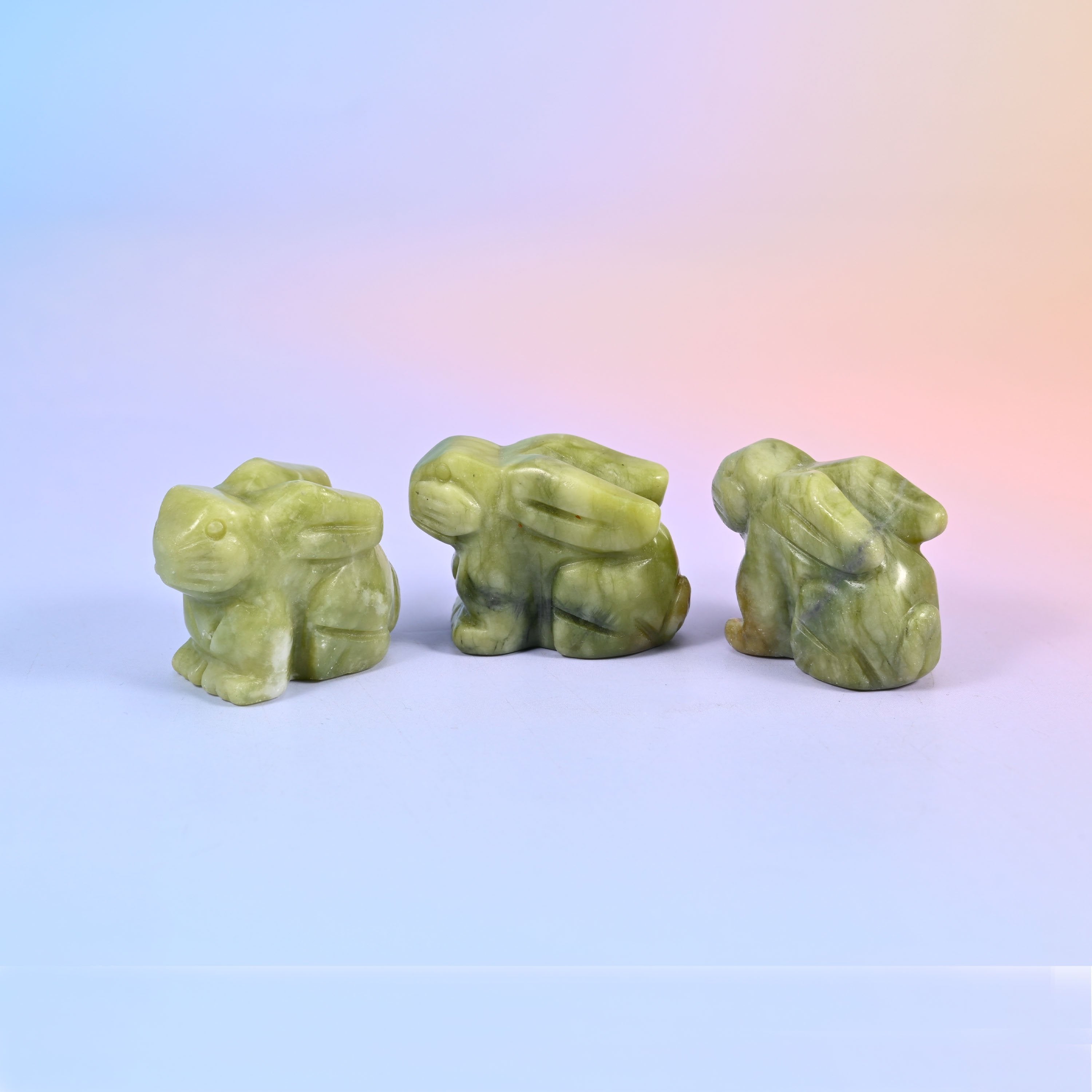 1.5 inch carved stone rabbit figurine, natural stone so veining and colour vary piece to piece