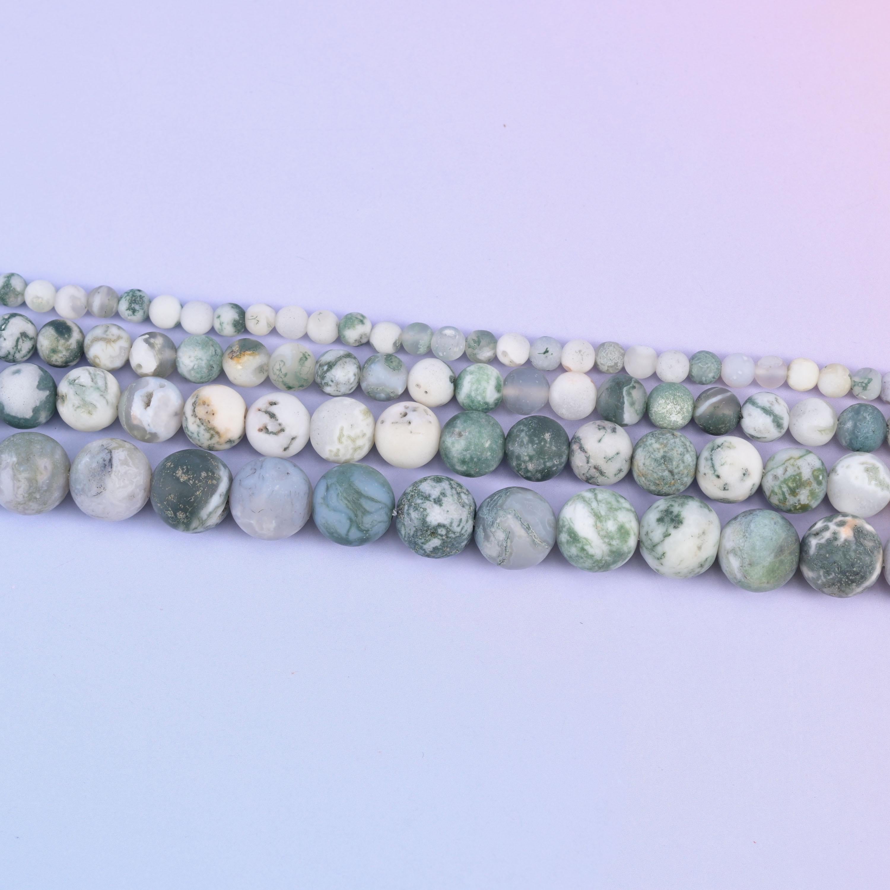 Green tree agate matte round beads in milky white with mossy dark green dendritic markings