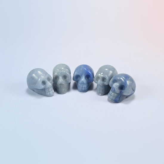 1 inch skull crystal carving in blue aventurine, blue natural stone with a soft shimmer