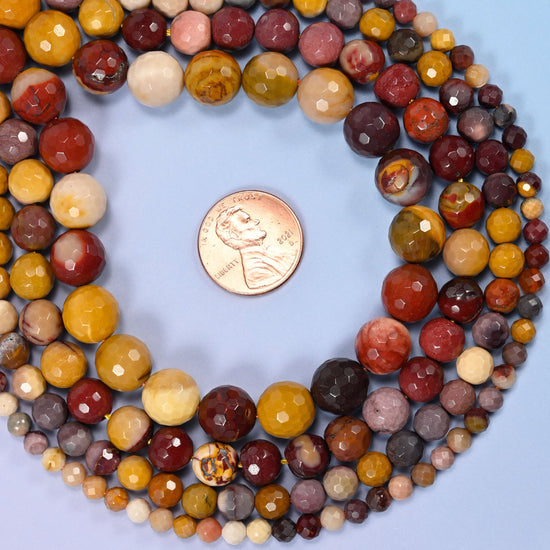 Mookaite Faceted Round Beads, sold by the 15 inch strand