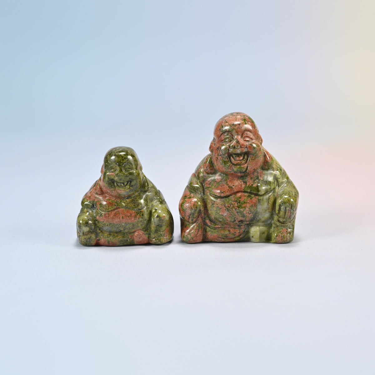 A 1.5 inch and a 2 inch unakite laughing Buddha crystal carving, green and pink natural stone