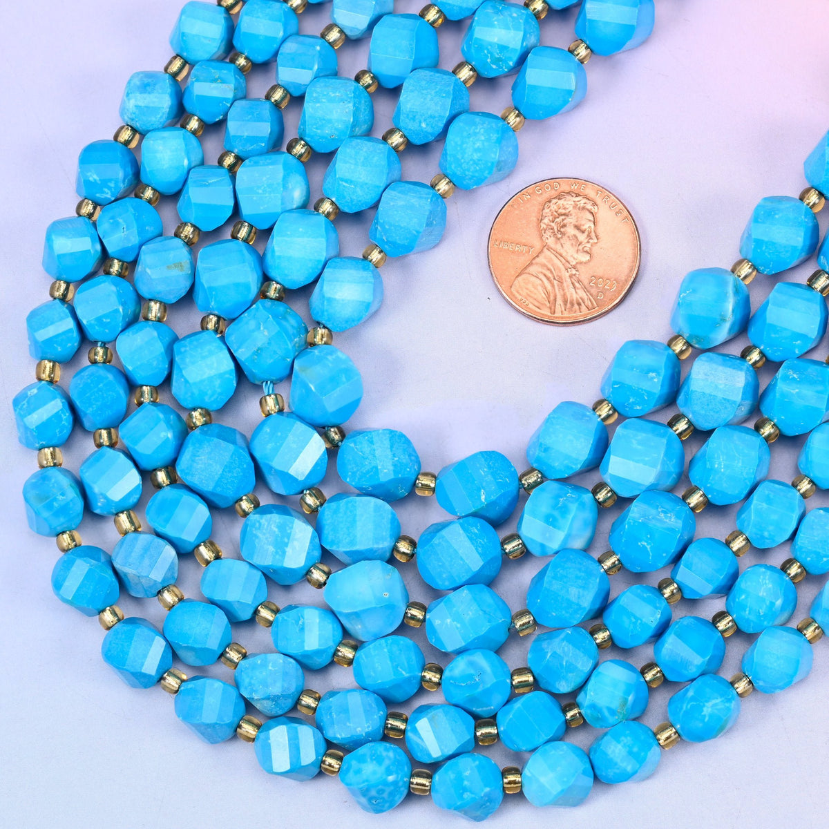 Faceted spiral twist cut dyed blue howlite beads