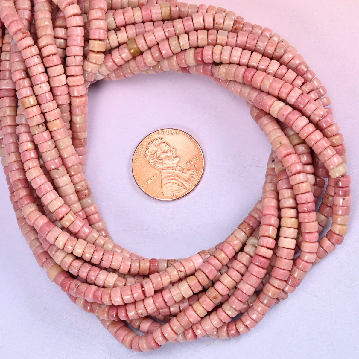 Pink Rhodonite Smooth Heishi Disc Beads, 15.5 Inch Strand.