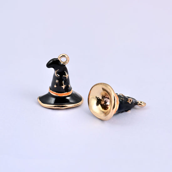 Enamel witch hat charms in black, one upright and one tipped to show the hollow gold-tone crown.