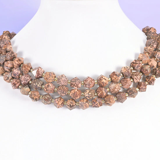 Chunky 10mm beads cut as eight-sided rhombus shapes, so each one reads as a faceted little gem rather than a bead. Eight…
