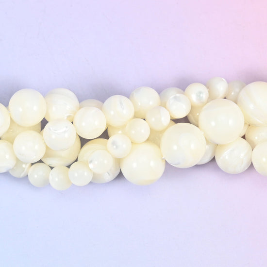 White Trochus Shell Smooth Round Beads, natural shell with a soft satin lustre