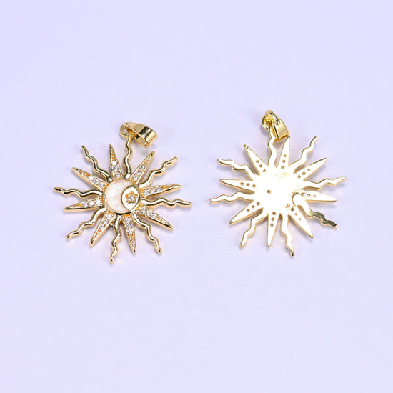 Sun charm with wavy zircon-paved rays framing an enamel moon and star center