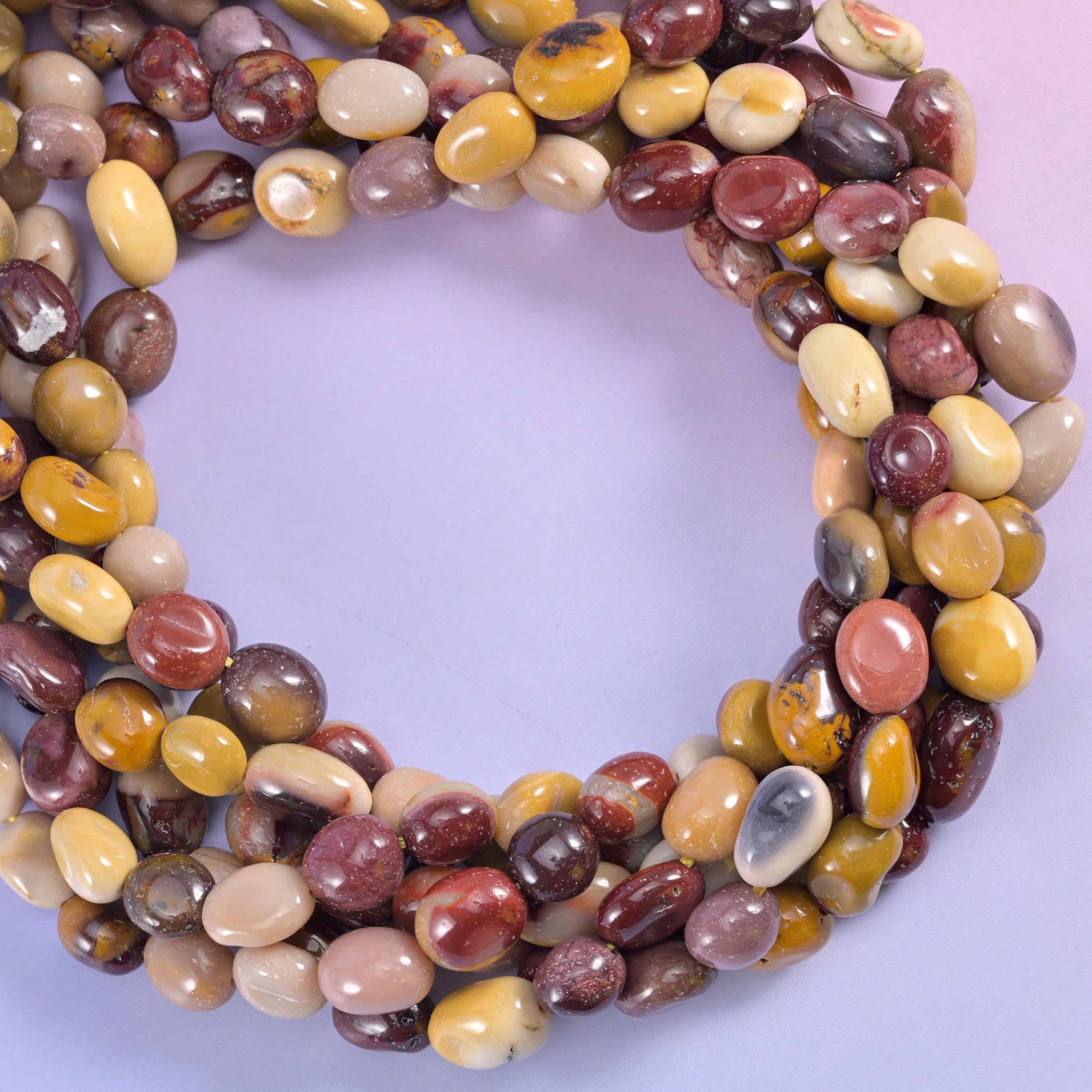 Mookaite Pebble Nugget Beads, every pebble streaked and banded a little differently under a soft polish