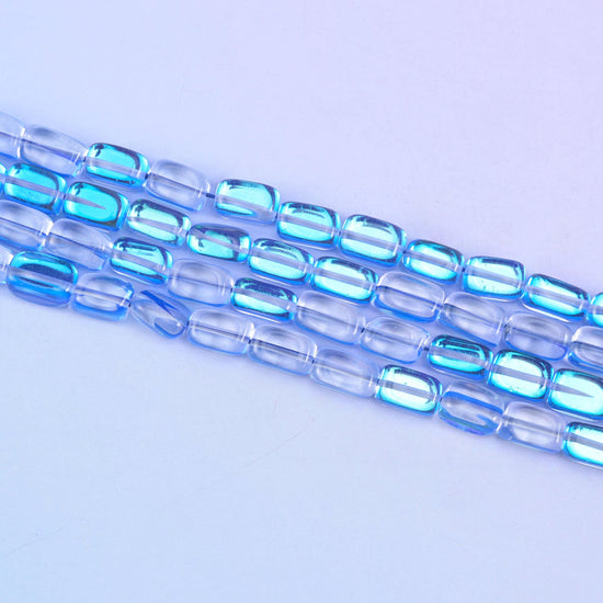 Blue Mystic Aura Rectangle Glass Beads 10-12mm in sapphire blue with an iridescent shimmer
