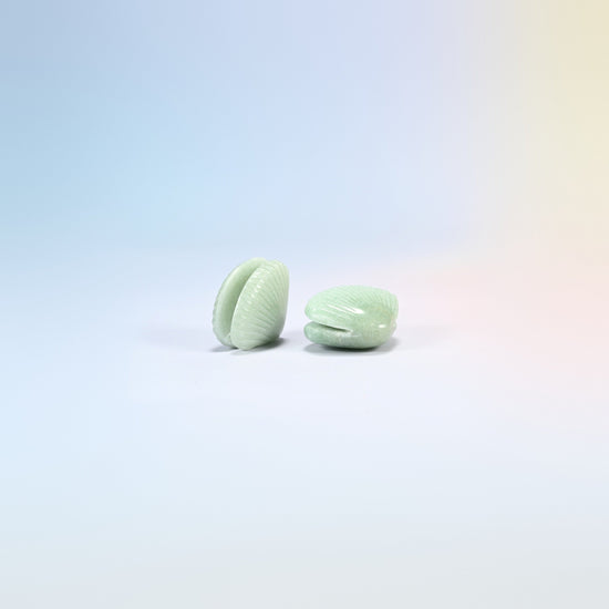 Two green aventurine clam shell crystal carvings, 1.5 inch, light green natural stone with ribbed shell lines