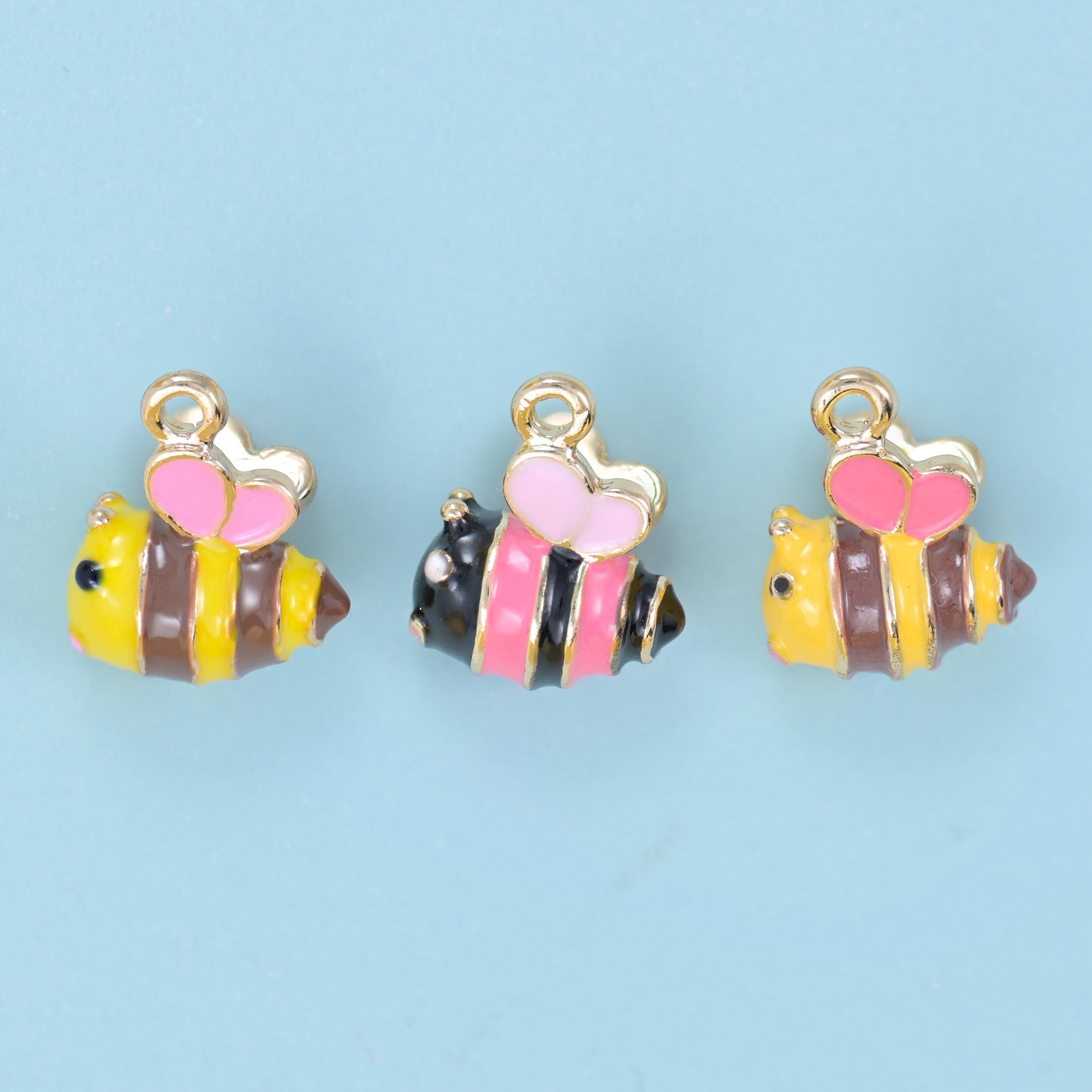 Enamel Bee Charm 14x11mm in yellow and black, pink and brown, or pink and black striping with pink heart-shaped wings