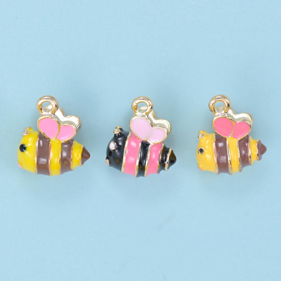 Enamel Bee Charm 14x11mm in yellow and black, pink and brown, or pink and black striping with pink heart-shaped wings
