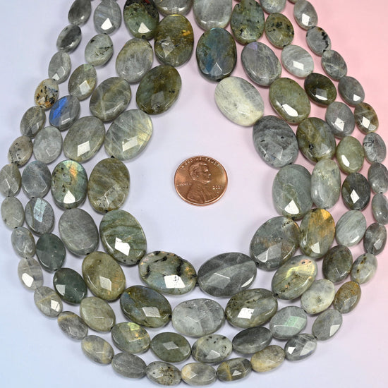 Gray Labradorite faceted oval beads in a deep teardrop loop, sold per 15 inch strand