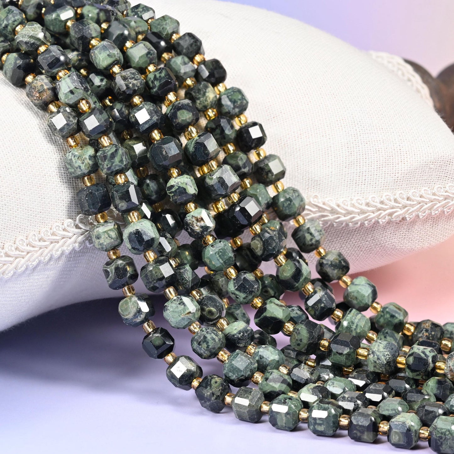 Kambaba Jasper Faceted Cube Beads, near-black stone swirled with mossy sage and pale green orbs