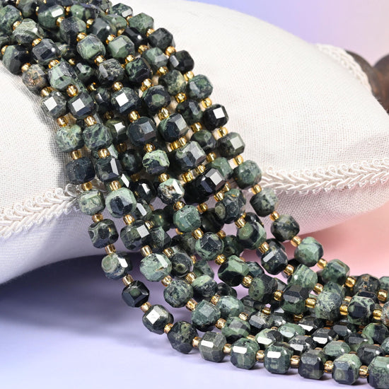 Kambaba Jasper Faceted Cube Beads, near-black stone swirled with mossy sage and pale green orbs
