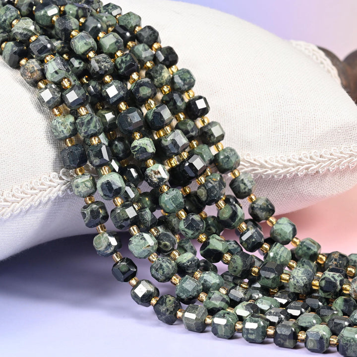 Kambaba Jasper Faceted Cube Beads, near-black stone swirled with mossy sage and pale green orbs