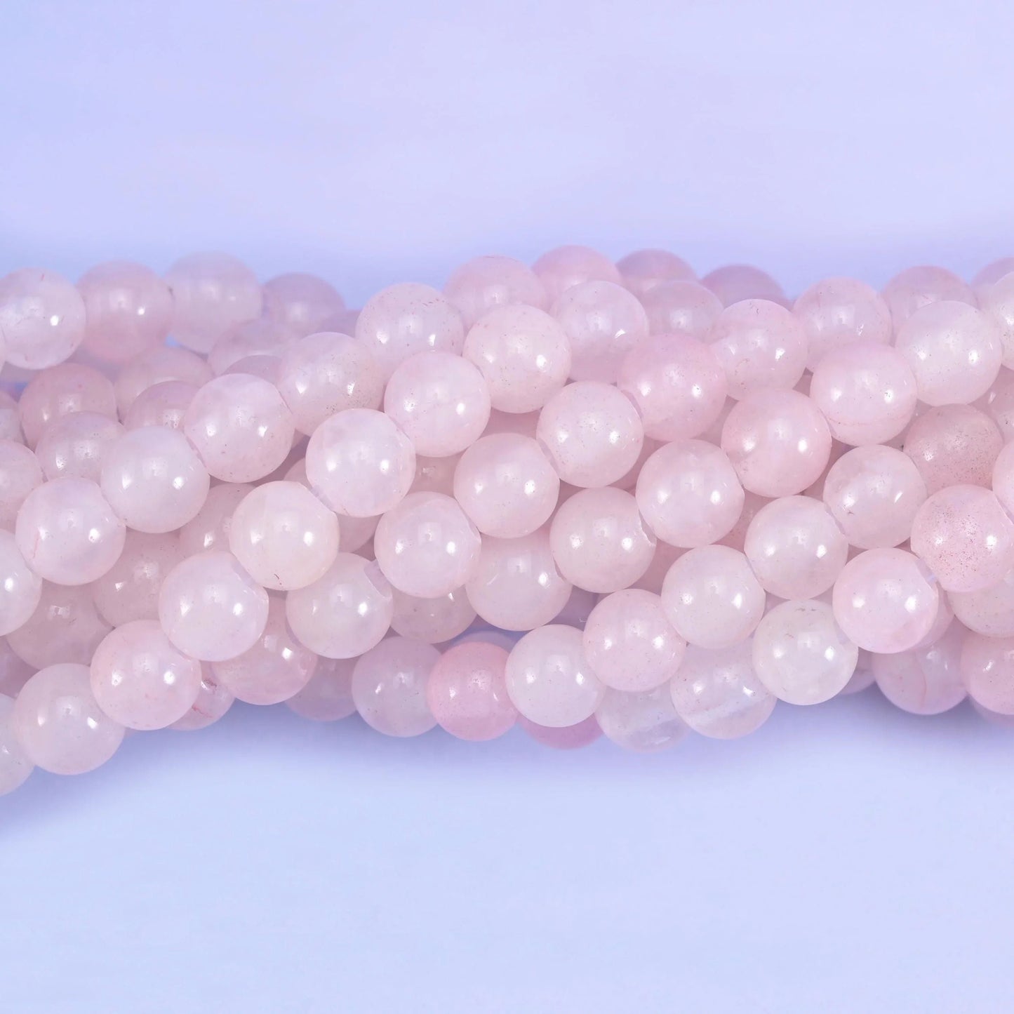 Smooth round cut Rose Quartz beads