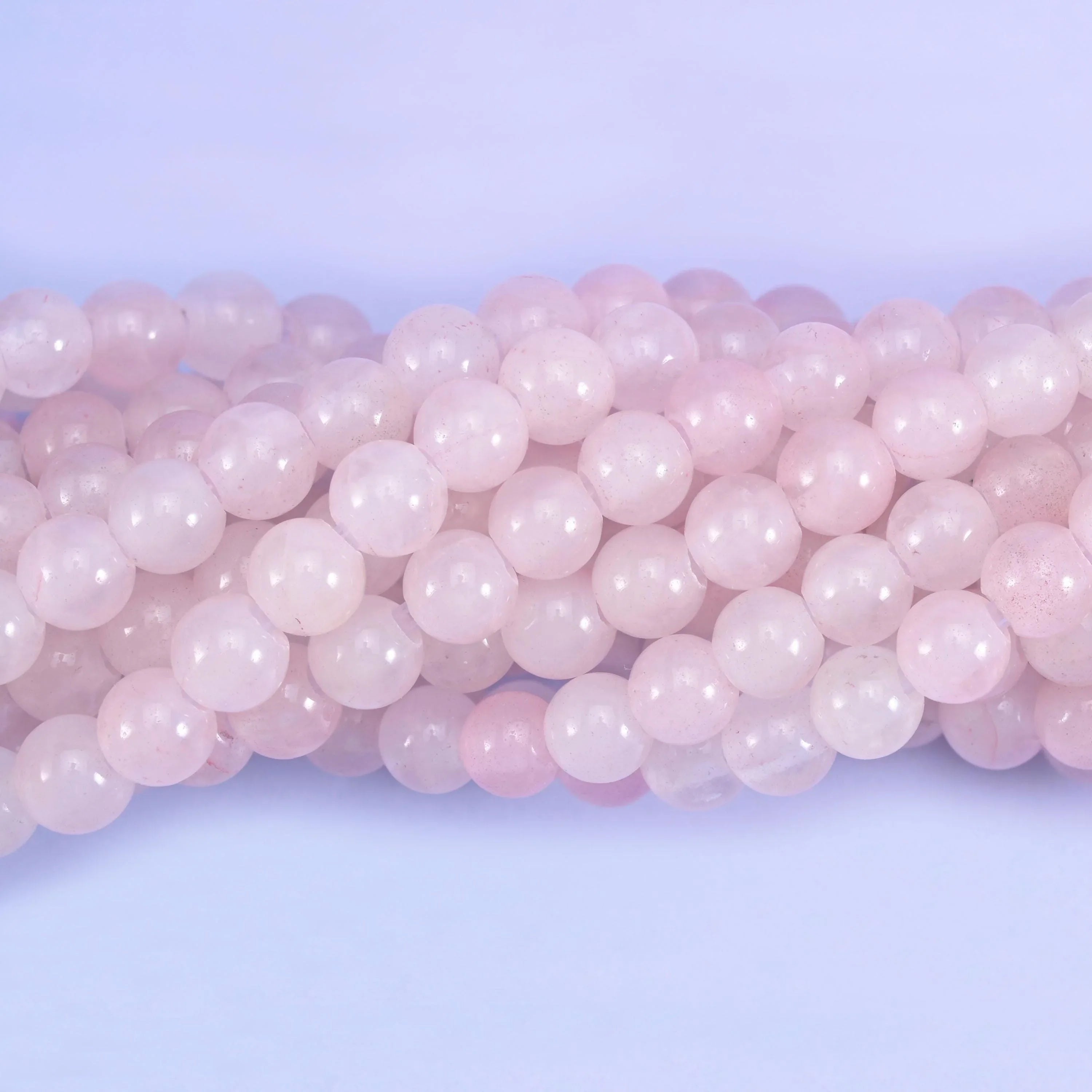 Smooth round cut Rose Quartz beads