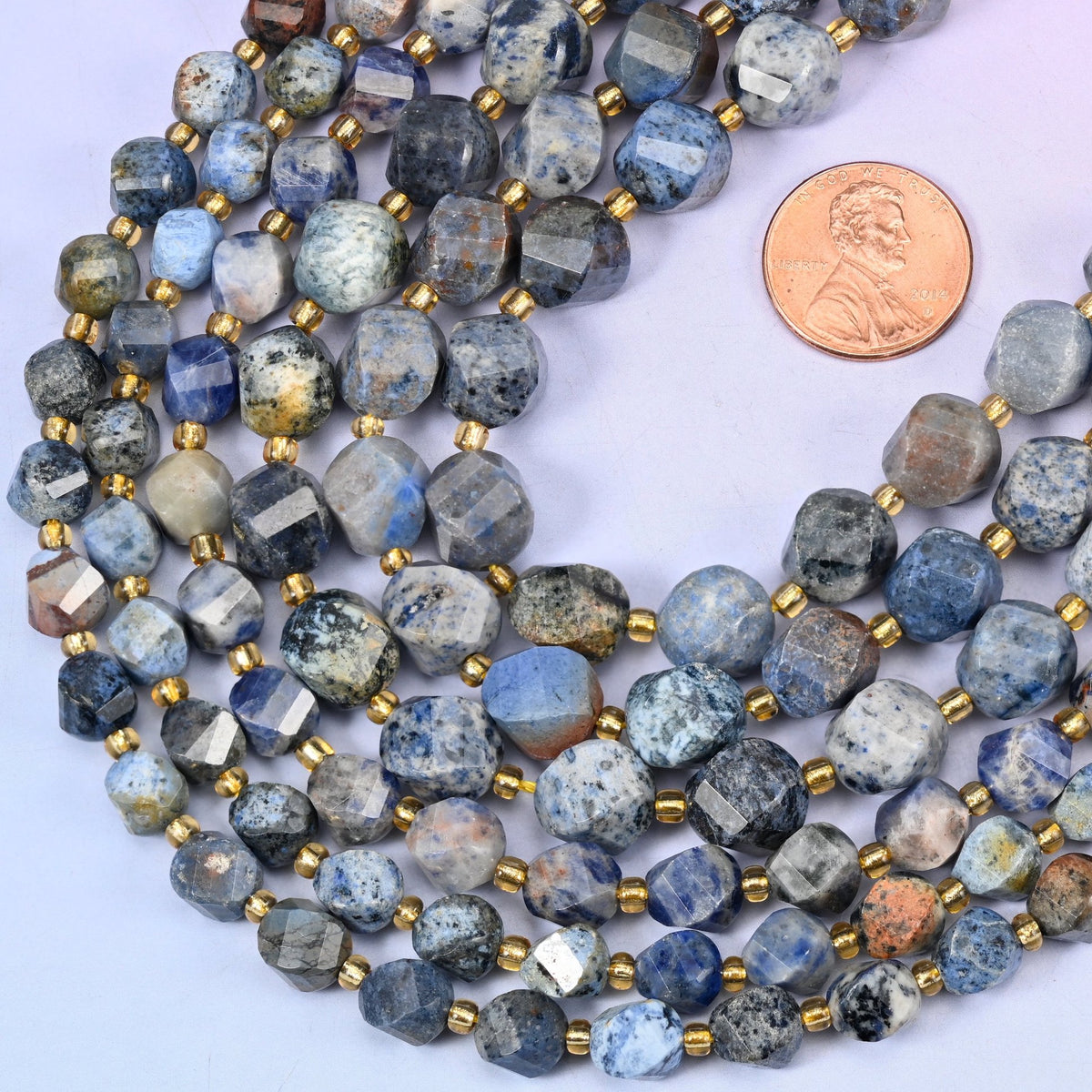 Faceted spiral twist cut Sunset Dumortierite beads