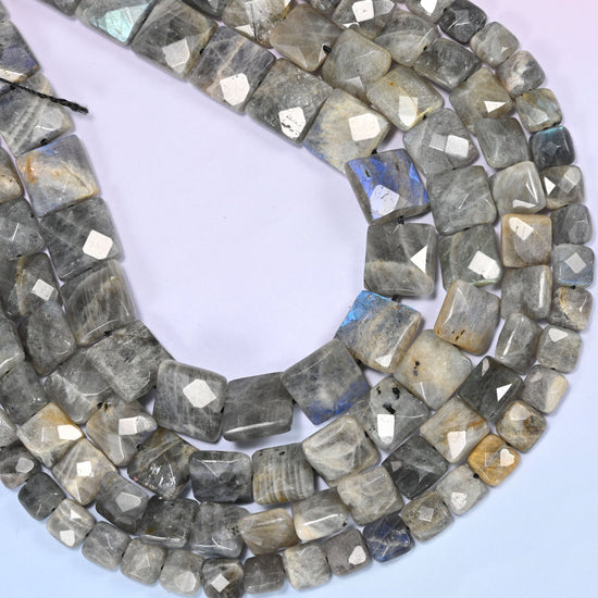 Gray Labradorite faceted flat square beads curved into a long open loop, clipped corners and faceting visible on each tile