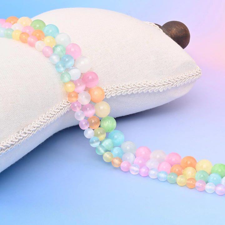 Multi-Color Selenite Smooth Round Beads in cotton-candy pink, mint green, sky blue and lemon.