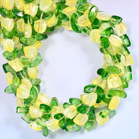Yellow Tulip Flower glass beads with leaf, close view of the coiled strands in yellow flower buds alternating with green glass leaves